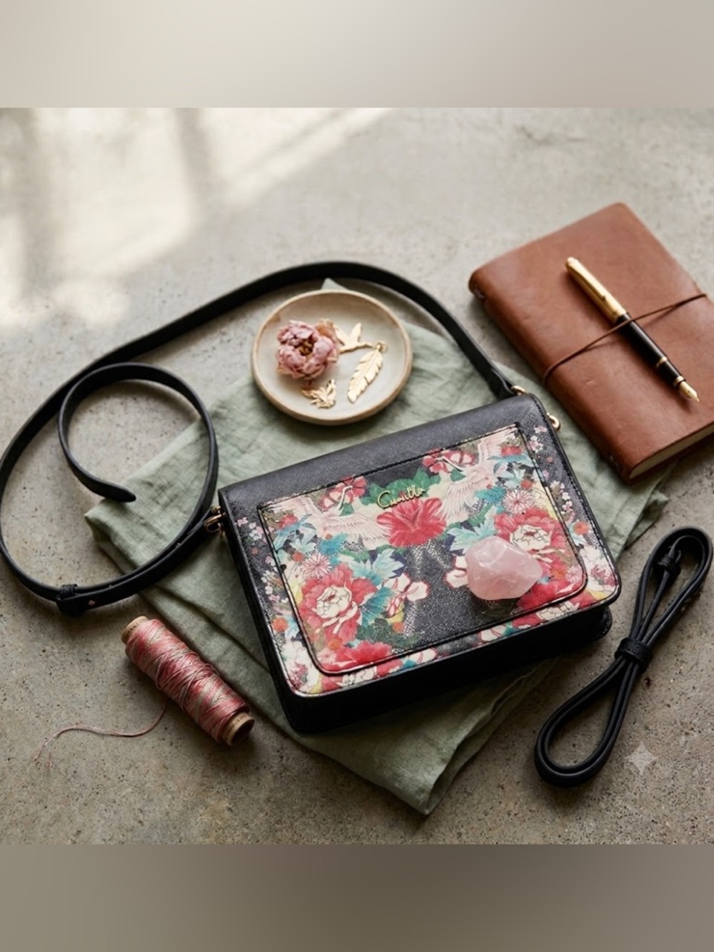CAMILLA Queen of Kings saffiano crossbody bag